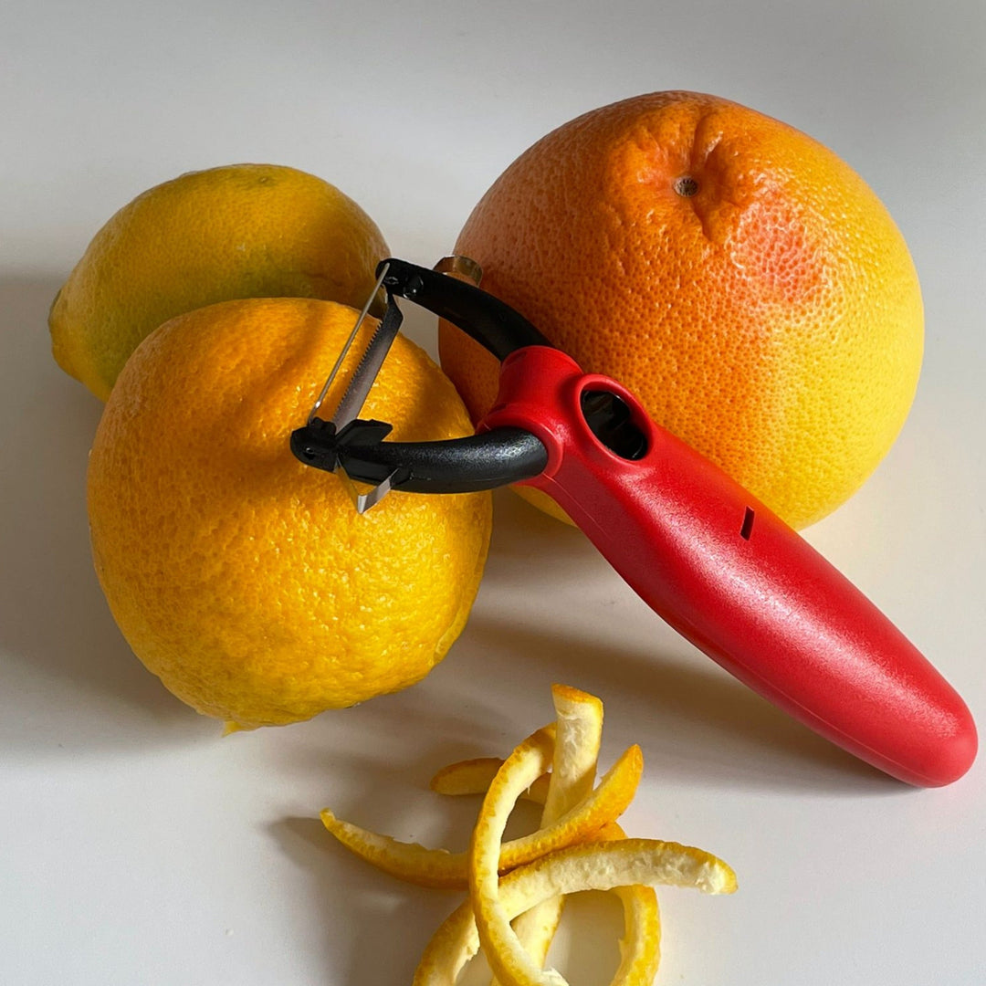 Éplucheur légumes multifonction avec planche mandoline orange